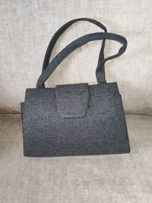 Handheld bag classic design like new, grey charcoal color