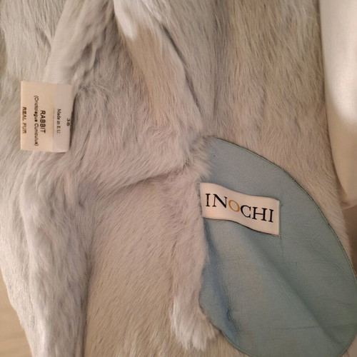 Elegant leather jacket with natural fur, size 38, like new, blue