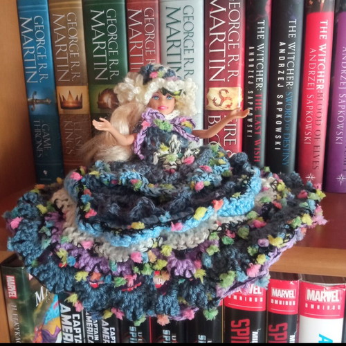 Handmade knitted dress and hat set for doll, bathroom decor