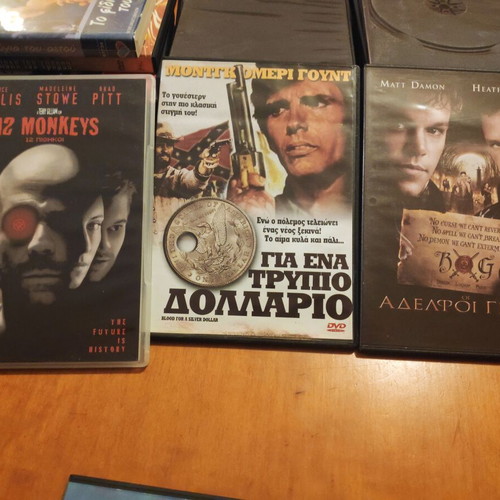 DVD movies used, pack with 12 Monkeys, For a Few Dollars, Brothers Grimm