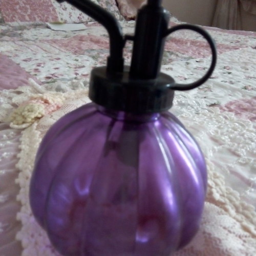 Antique cologne atomizers used, blue and purple