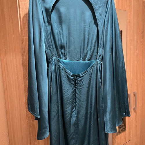 Lace dress used, size Small, with batwing sleeves and open back