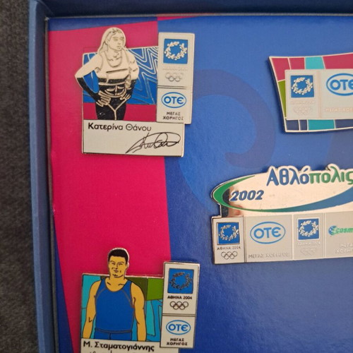 Athens 2004 pins in collectible case like new