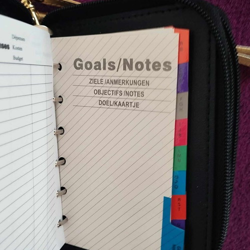 Organizer agenda like new, gold and black
