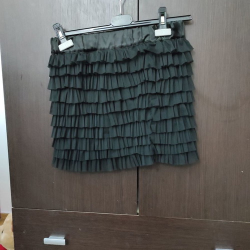 Black skirt with pleats used, size medium