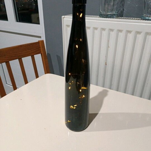 Bottle with cork and battery lights like new