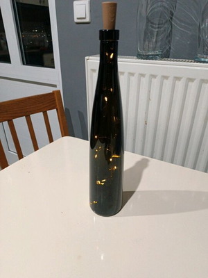 Bottle with cork and battery lights like new