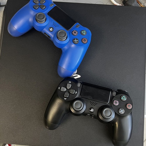 PlayStation 4 Pro 1TB like new with 2 controllers