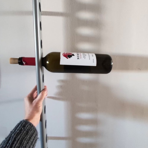 Wall-mounted metal wine rack 12 bottles, unused with slight marks