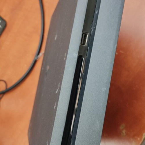 PlayStation 4 Slim 500GB like new with 4 games and 3 controllers