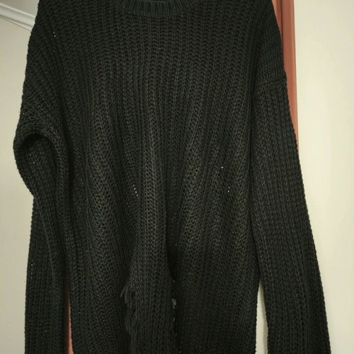 Black knitted sweater with fringes