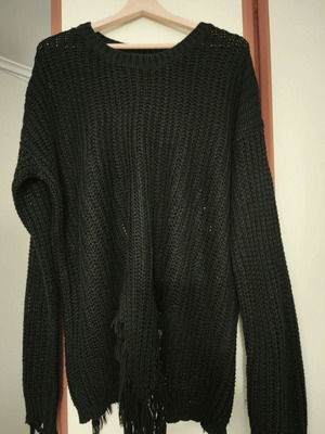 Black knitted sweater with fringes