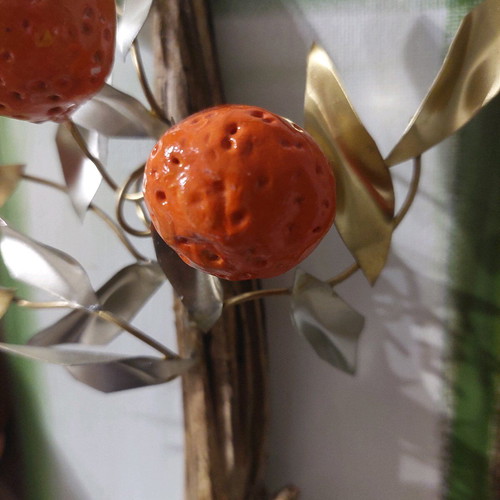 Handmade mixed media wall art with natural materials and metal leaves like new