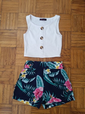 Children's summer set with floral shorts and white top with decorative buttons, age 4