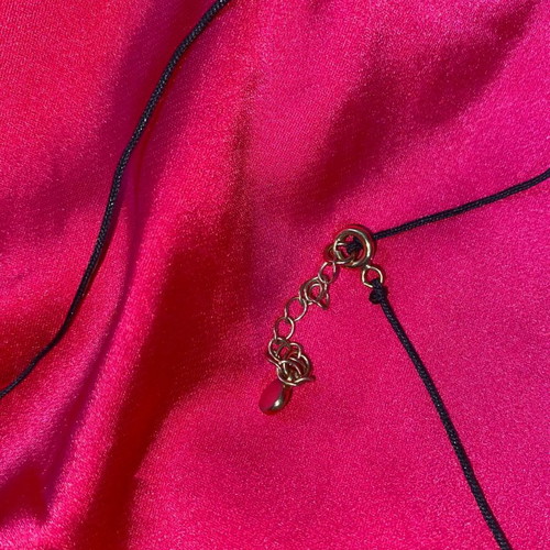 Necklace new handmade, black with gold details and zircon
