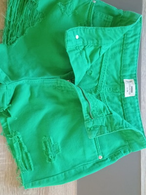 Denim green women's shorts like new with high waist and distressed details
