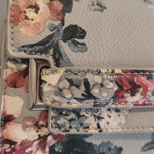 Blue floral handbag with matching strap