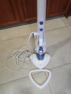 Electric mop and steam cleaner used with all accessories
