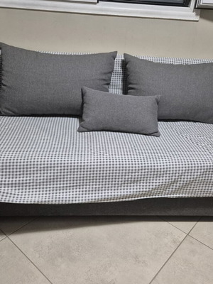 Corner sofa bed with storage, used