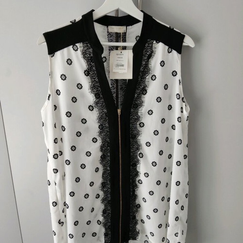 Queen Fashion sleeveless black and white blouse new, size large