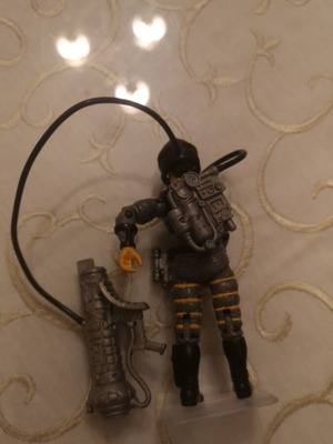 G.I. Joe action figure with weapons