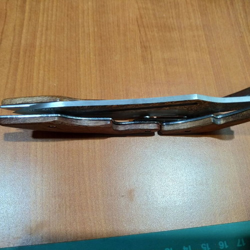Folding knife with opening mechanism and Laser Pattern Damascus blade, like new