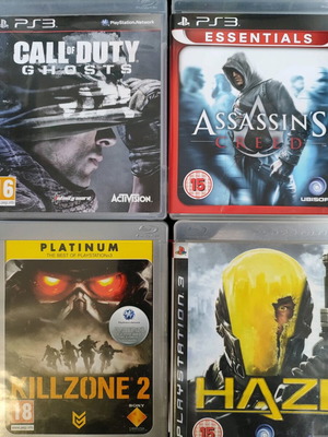 Pack of 4 used PS3 games: Haze, Call of Duty Ghosts, Killzone 2, Assassin's Creed