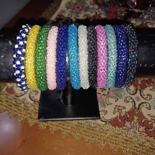 Bracelets new, set of 4 in various colors