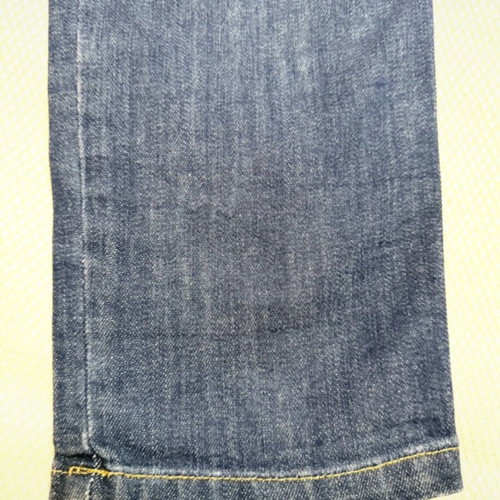 Vintage blue Rococo jeans with studs and rips like new