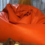 Orange bean bag pouf