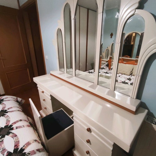 Dressing table with chair used and drawers on both sides
