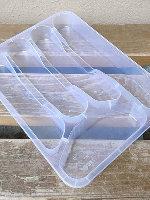 Plastic cutlery tray used for kitchen