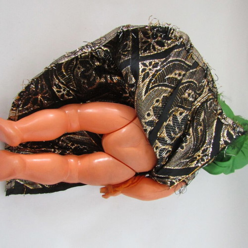 Vintage souvenir doll with traditional oriental costume used