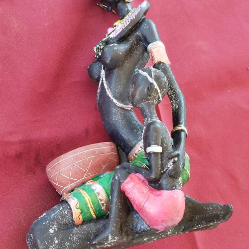 African statue of mother and child new with colorful decorations