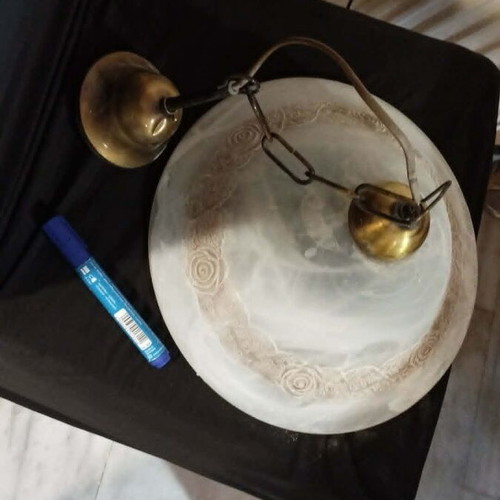 Glass ceiling light used with small bronze decorative chip