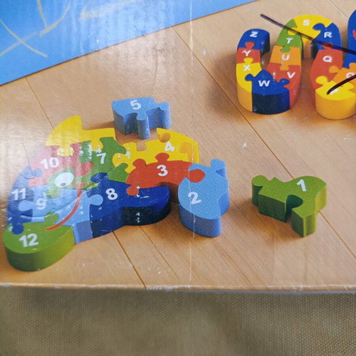 Wooden puzzle used, the dolphin, for ages 3 and up