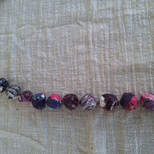 Long handmade bow tie necklace in purple and pink