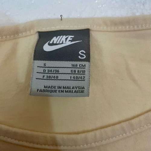 Nike sleeveless women's top size S like new, beige with designs and pocket