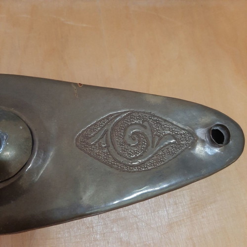 Copper oil lamp used with carved decorations and patina