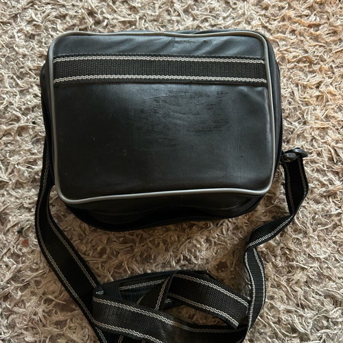 Sony camera like new with handle, flash, and bag