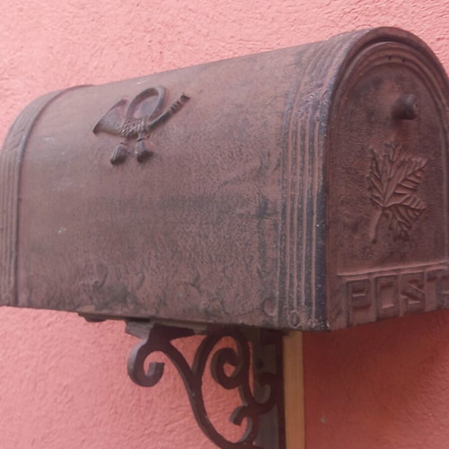 Cast iron mailbox used with metal base for wall or pole mounting