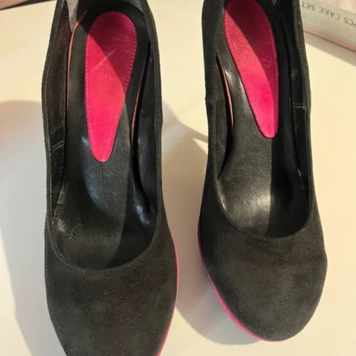 Castor pumps with 3 cm platform and 12 cm heel like new
