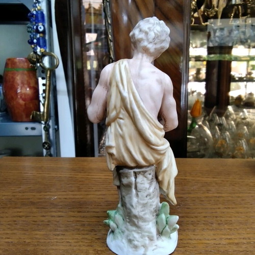 Ceramic figurine new with young male figure holding a lyre
