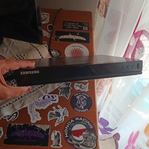 Samsung DVD player with remote control, new, dimensions 30x21