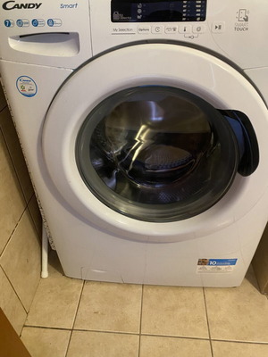 Candy CS1272DE washing machine like new, 7 kg capacity