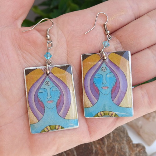 Handmade earrings with resin glass on aluminum base