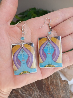 Handmade earrings with resin glass on aluminum base