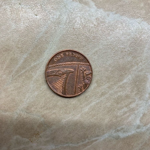Coins one penny 2010 and five pence 1991 used