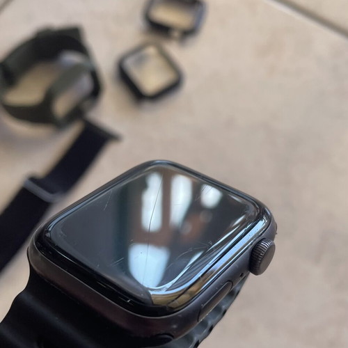Apple Watch Series 5 44mm with charging cable, straps and screen protectors