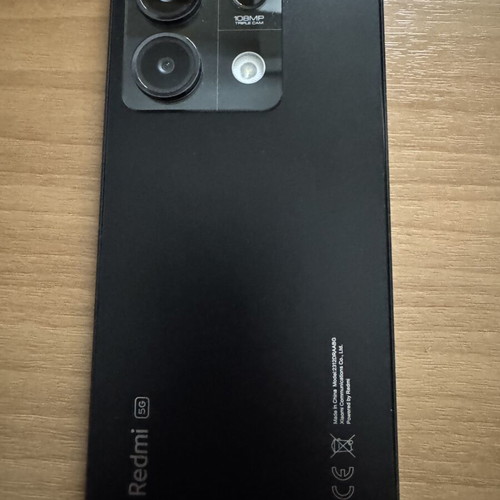 Redmi Note 13 5G smartphone like new, 6GB RAM, 128GB storage, graphite black